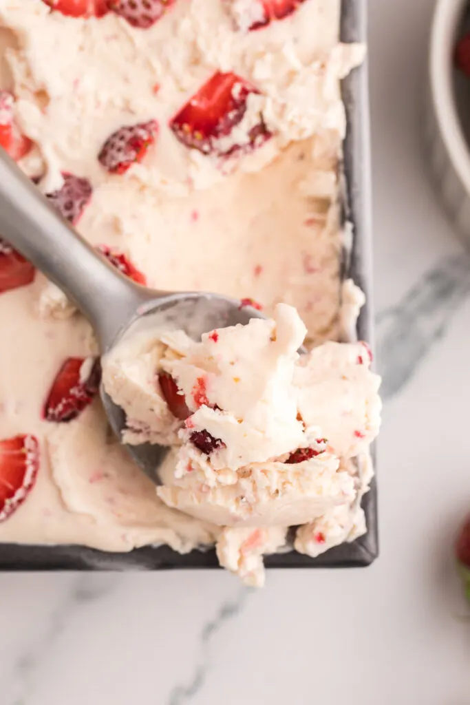 4-ingredient strawberry ice cream recipe on a scoop. 
