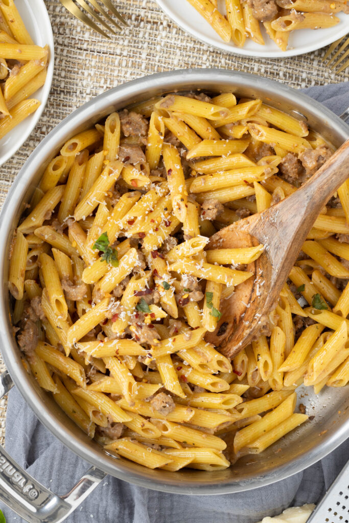 Penne pasta in a skillet. 