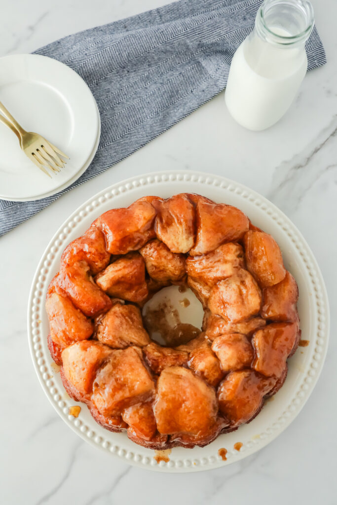 Monkey bread on a cake pan on the counter. 
