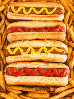 Hot dogs on a cooking sheet
