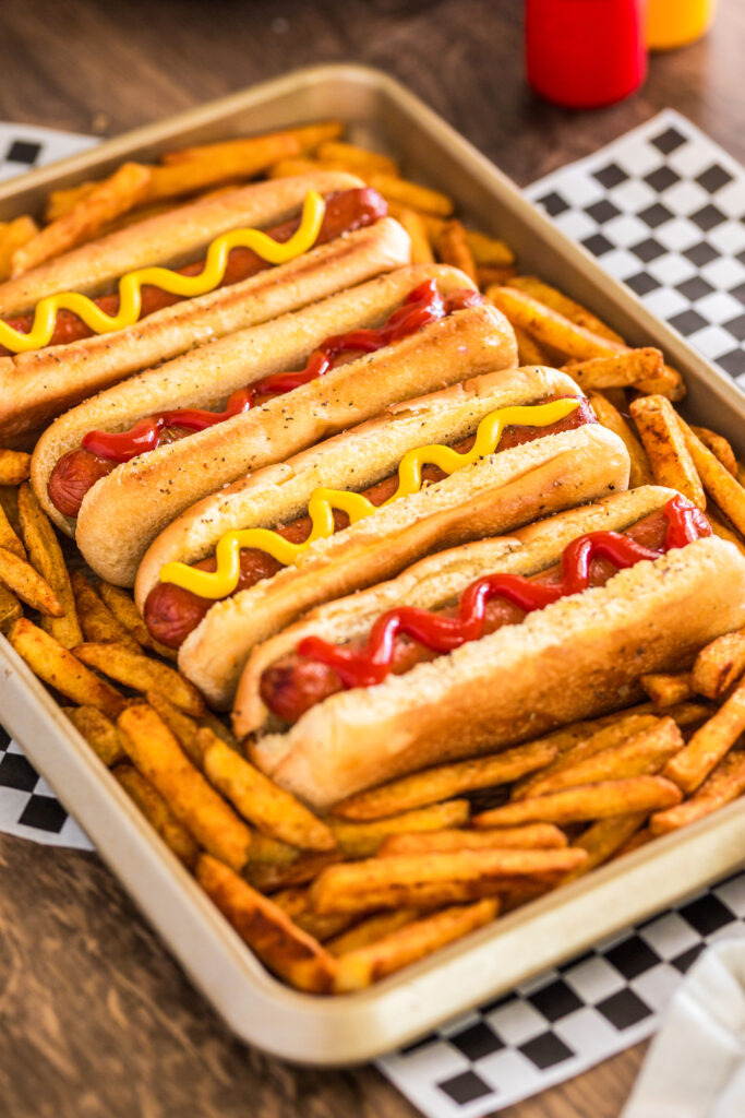 Hot dogs on a plate. 