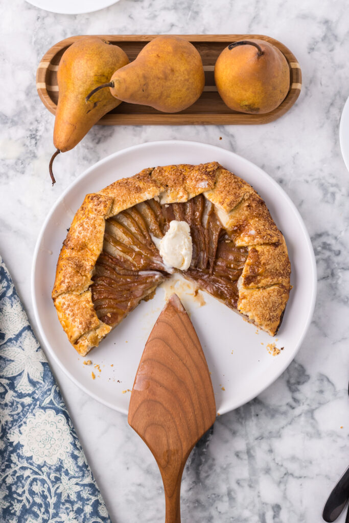 Pear galette on a white plate. 