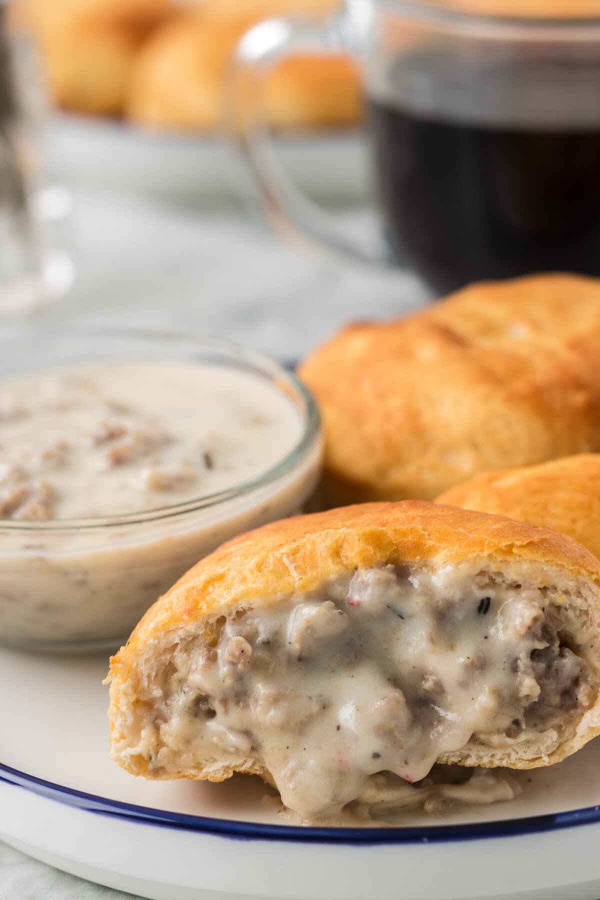 Air Fryer Sausage Gravy Stuffed Biscuits on a plate.